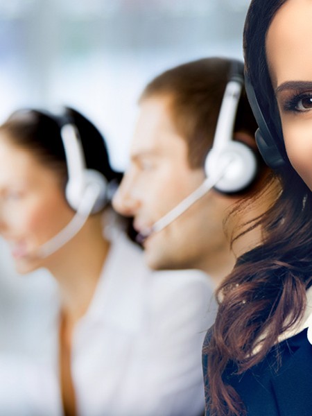 contact centre agents wearing headsets